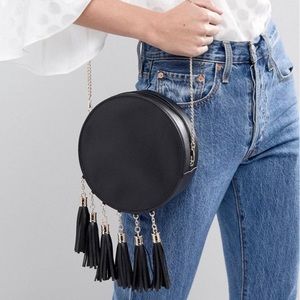 French connection circular bag with tassle